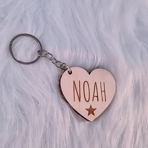 Houten sleutelhanger "Boven De Wolken"