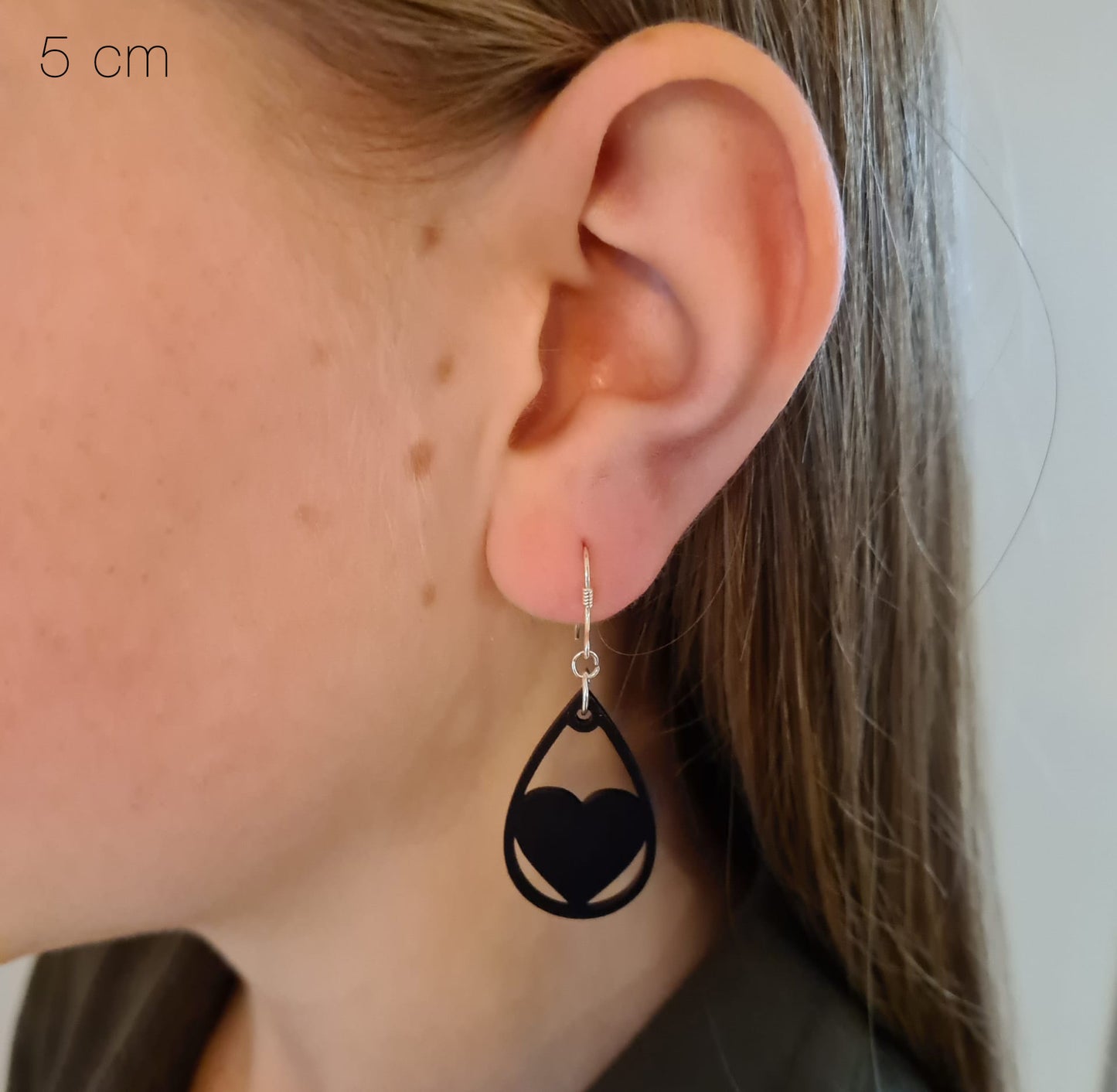 Zwarte druppels met hartje